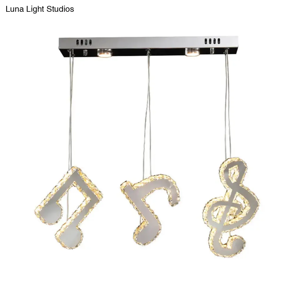 Modern Stainless Steel LED Pendant Light with Clear Crystals and Musical Note Suspension